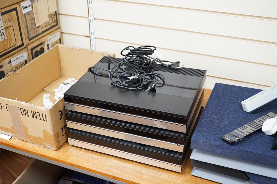 A Bang and Olufsen 6500 hi-fi system, comprising of a Beocord 6500, a Beogram CD 6500, a Beomaster 6500, and a master control panel, together with a pair of floor standing pedestal speakers, 164cm high, and pair of type